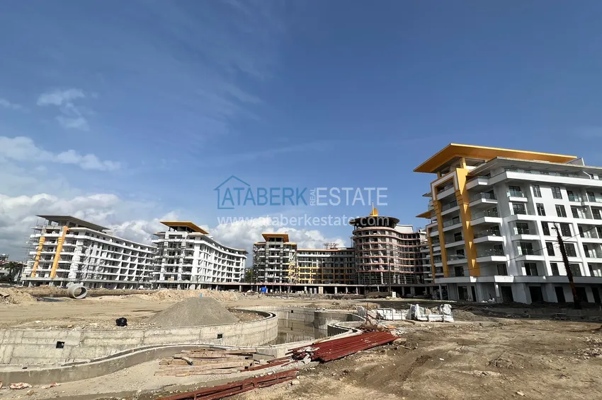 Фото - Квартира 1+1 площадью 85 м2 от инвестора в строящемся комплекс-отеле - Алания, район Тюрклер 1