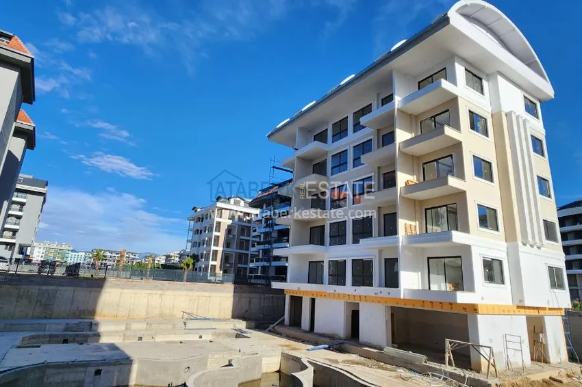 Фото - Квартира в новом жилом комплексе в районе Каргыджак в Алании 1