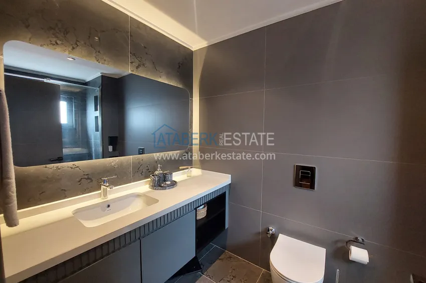 Приобрести Аренда двухуровневой виллы сегмента премиум с частным бассейном в районе Махмутлар 21