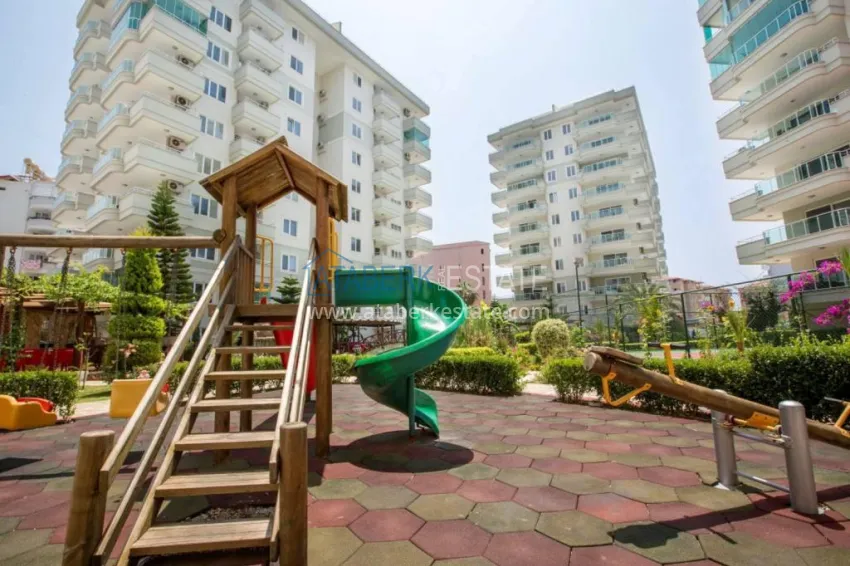 Квартира 2+1 в Алании район Тосмур, меблированная с застекленным балконом. Недвижимость под ВНЖ 21 