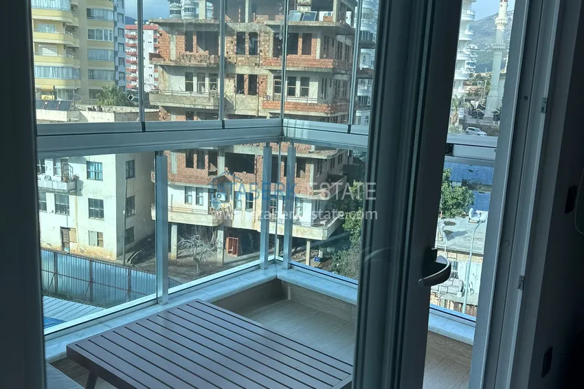Приобрести Квартира с видом на море, 2 застекленными балконами и отоплением в 300 метрах от моря – район Тосмур 27