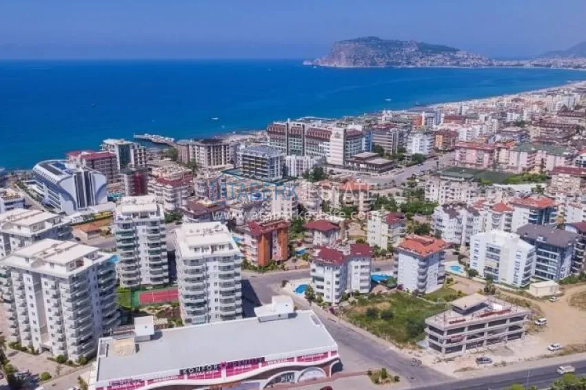 Квартира 2+1 в Алании район Тосмур, меблированная с застекленным балконом. Недвижимость под ВНЖ 3 