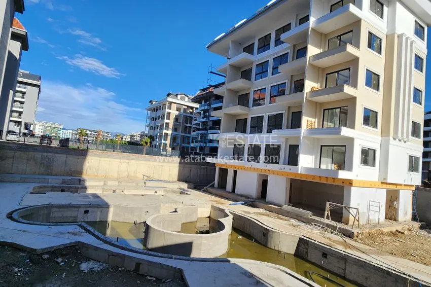 Фото - Квартира в новом жилом комплексе в районе Каргыджак в Алании 2