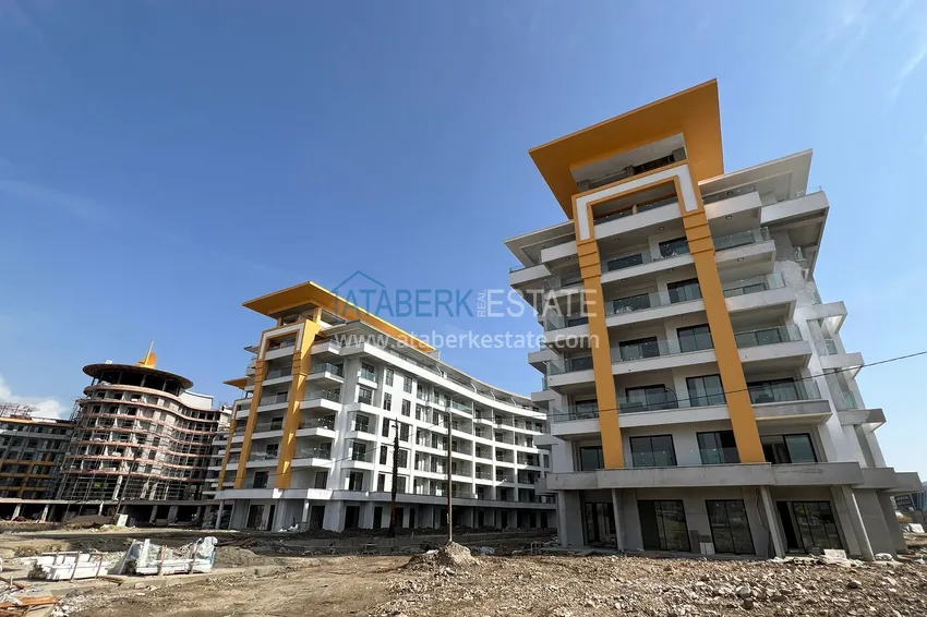 Фото - Квартира 1+1 площадью 85 м2 от инвестора в строящемся комплекс-отеле - Алания, район Тюрклер 2