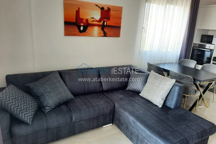 Приобрести Меблированная двухкомнатная квартира в районе Каргыджак – 250 метров от моря 3 