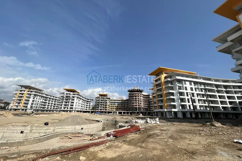 Фото - Квартира 1+1 площадью 85 м2 от инвестора в строящемся комплекс-отеле - Алания, район Тюрклер 3