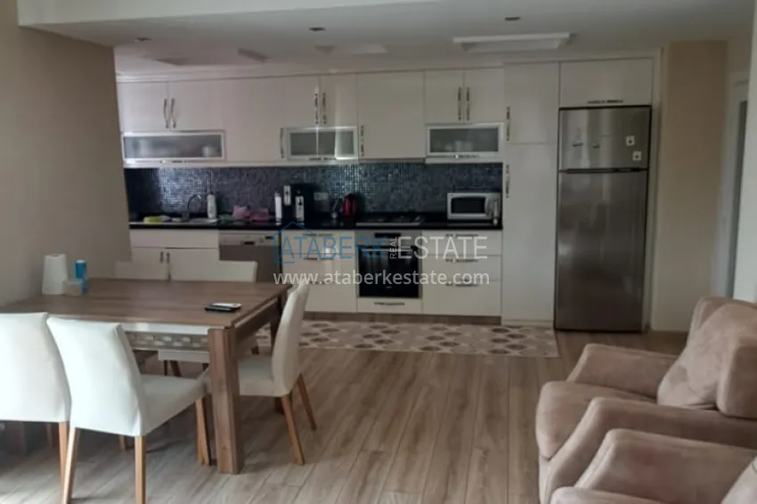 Приобрести Квартира 2+1 в Алании район Тосмур, меблированная с застекленным балконом. Недвижимость под ВНЖ 4 