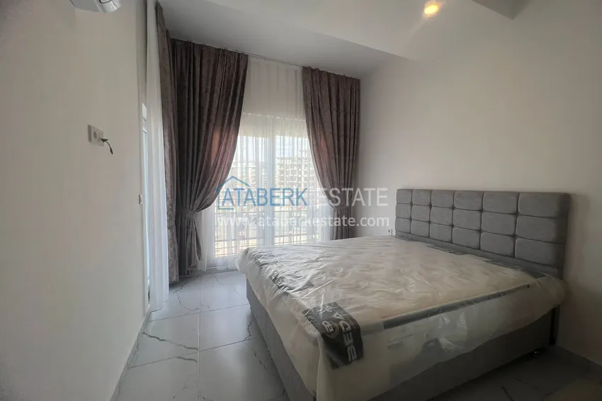 Приобрести Двухкомнатная квартира комфорт класса для аренды, на 9 этаже с видом на море и город в Авсалларе №96 4 