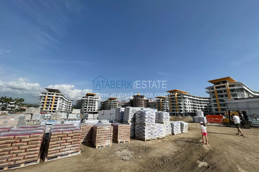 Фото - Квартира 1+1 площадью 85 м2 от инвестора в строящемся комплекс-отеле - Алания, район Тюрклер 4