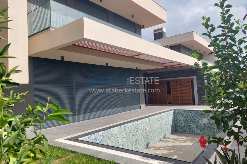 Аренда двухуровневой виллы сегмента премиум с частным бассейном в районе Махмутлар 4