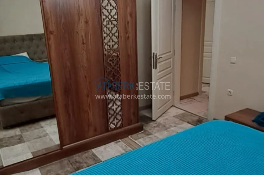 Приобрести Квартира 2+1 в Алании район Тосмур, меблированная с застекленным балконом. Недвижимость под ВНЖ 6 