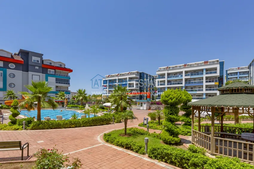 Квартира 1+1 меблированная с боковым видом на море, район Кестель – Алания 11