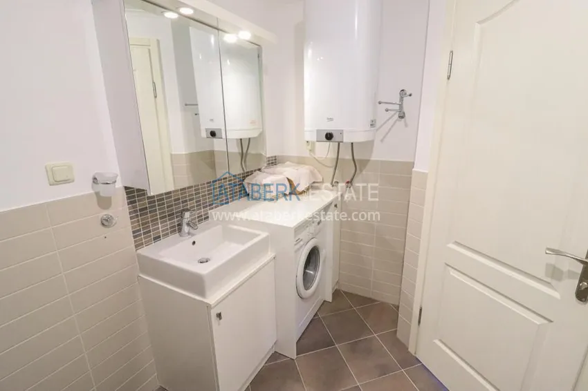 Приобрести Квартира 2+1 с мебелью и выходом в сад - район Конаклы, Алания 10 