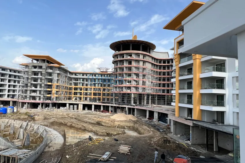 Фото - Квартира 1+1 площадью 85 м2 от инвестора в строящемся комплекс-отеле - Алания, район Тюрклер 6