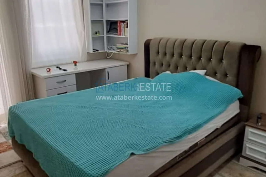 Приобрести Квартира 2+1 в Алании район Тосмур, меблированная с застекленным балконом. Недвижимость под ВНЖ 7 