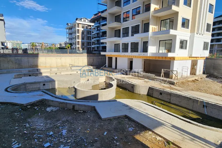 Фото - Квартира в новом жилом комплексе в районе Каргыджак в Алании 6