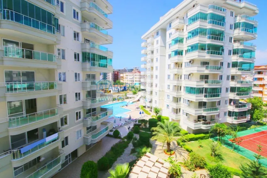 Квартира 2+1 в Алании район Тосмур, меблированная с застекленным балконом. Недвижимость под ВНЖ 8 