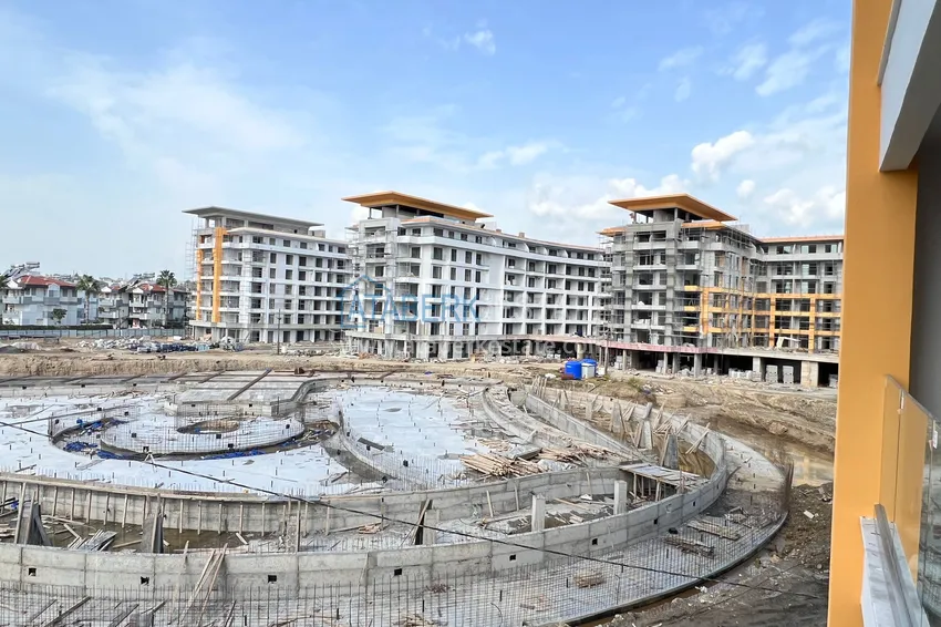Фото - Квартира 1+1 площадью 85 м2 от инвестора в строящемся комплекс-отеле - Алания, район Тюрклер 7