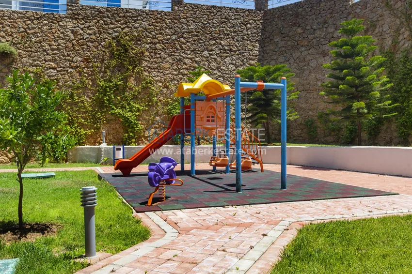 Квартира 1+1 меблированная с боковым видом на море, район Кестель – Алания 13