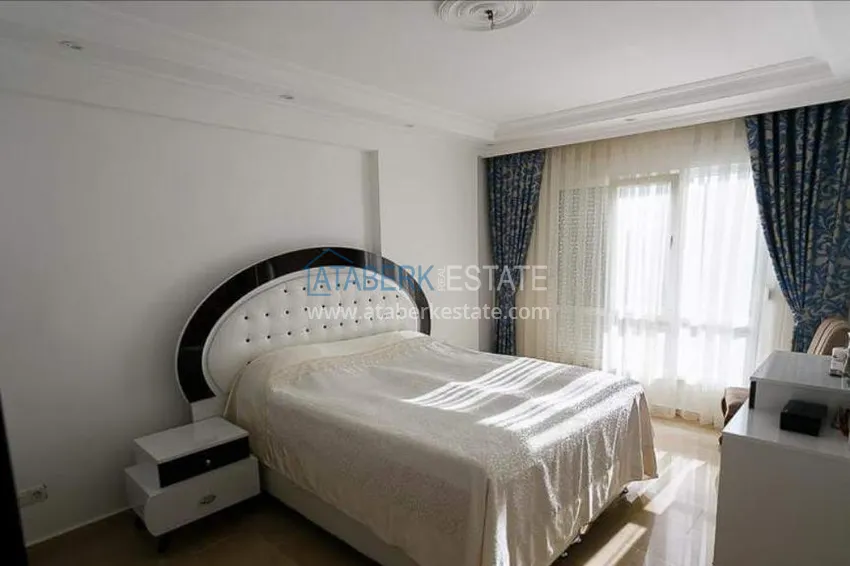 Приобрести Трехкомнатная меблированная квартира с видом на горы в районе Тосмур 9