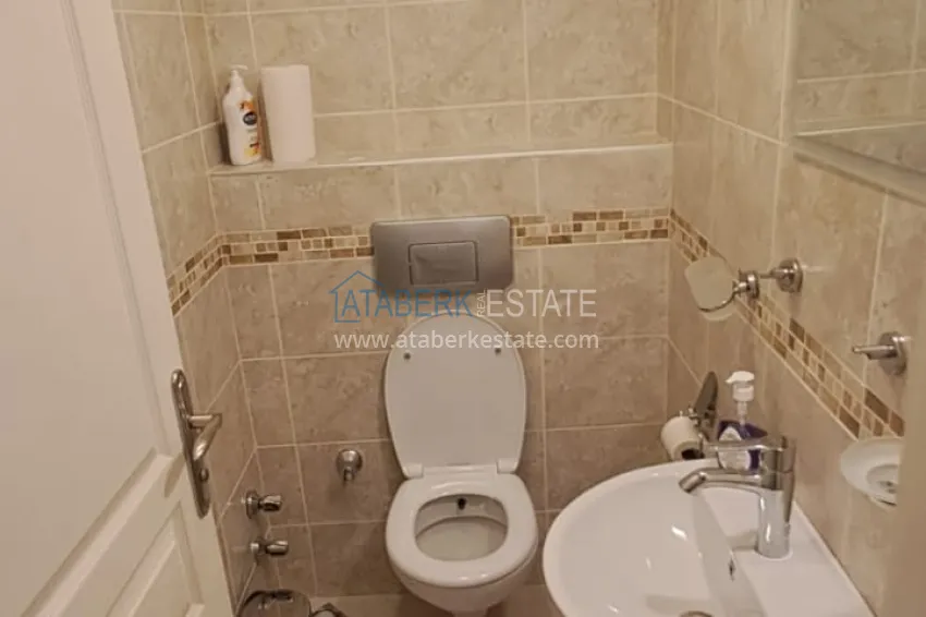 Приобрести Квартира 2+1 в Алании район Тосмур, меблированная с застекленным балконом. Недвижимость под ВНЖ 10 