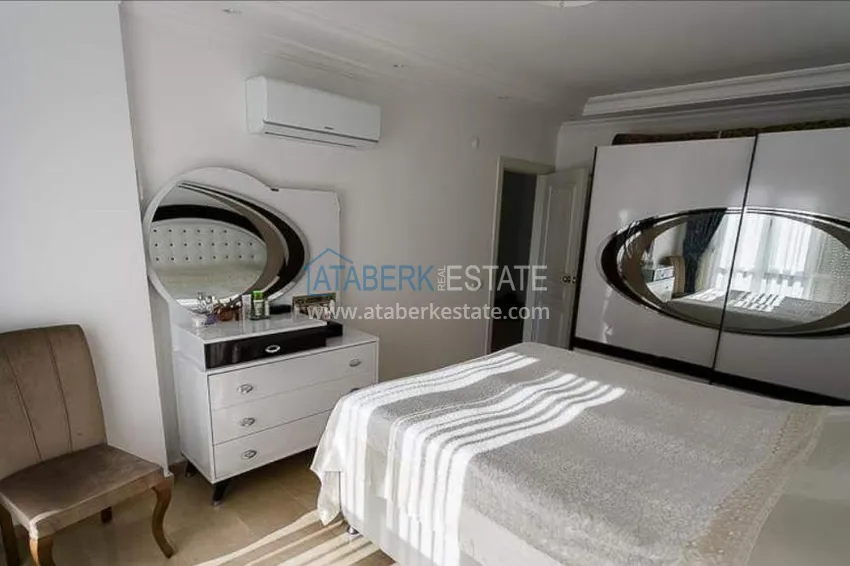 Приобрести Трехкомнатная меблированная квартира с видом на горы в районе Тосмур 10