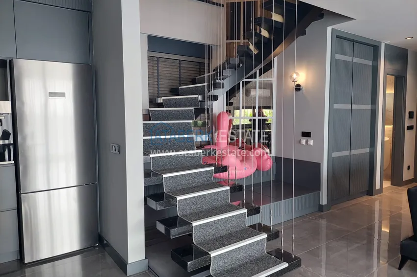 Приобрести Аренда двухуровневой виллы сегмента премиум с частным бассейном в районе Махмутлар 9