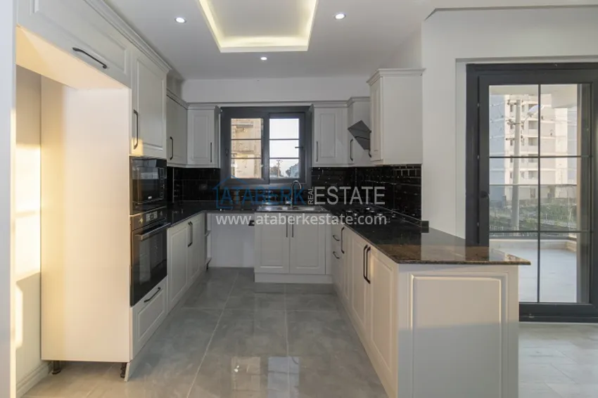 Приобрести Квартиры в новом жилом комплексе комфорт-класса в районе Арпачбахшиш - Мерсин 7 