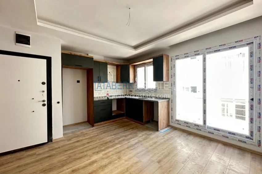 Квартира 1+1 с чистовой отделкой в районе Арпачбахшише, Мерсин 4 