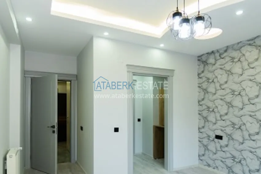 Приобрести Квартиры в новом жилом комплексе комфорт-класса в районе Арпачбахшиш - Мерсин 18 