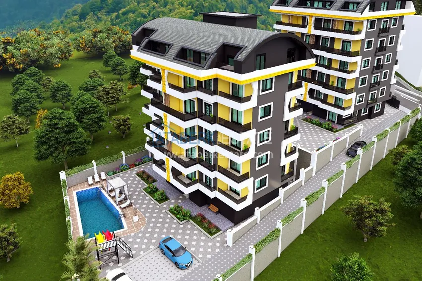 Уютный комплекс на этапе строительства в верхней части района Оба – Чиплаклы, Алания 1