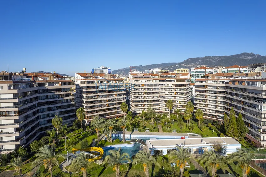 Недвижимость под ВНЖ. Квартира от собственника с мебелью, застекленными балконами и видом на горы в Алании, район Тосмур 2 