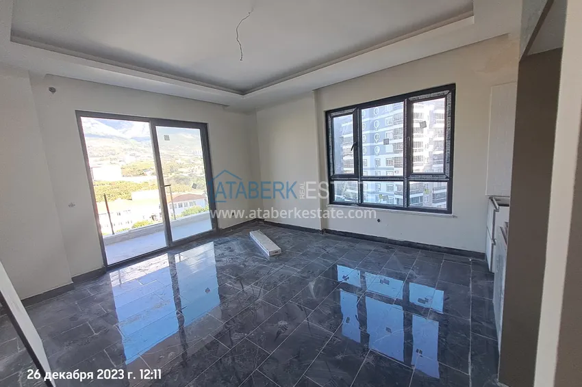 Приобрести Квартира 1+1 от инвестора в жилом комплексе на этапе строительства, район Махмутлар, Алания, 60 кв.м, 5 этаж 2 