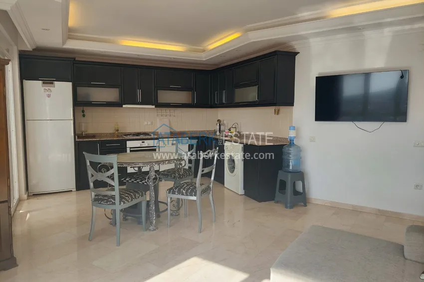 Приобрести Квартира 2+1 с мебелью и видом на море в районе Джикджилли – Алания 4 