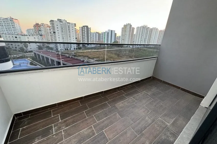 Приобрести Квартира 1+1 в новом жилом комплексе в 300 метрах от моря Арпачбахшиш – Мерсин 8 