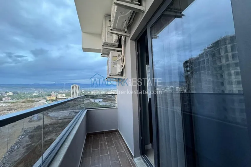 Приобрести Квартира 2+1 меблированная частично вид на море район Арпачбахшиш – Мерсин 24 