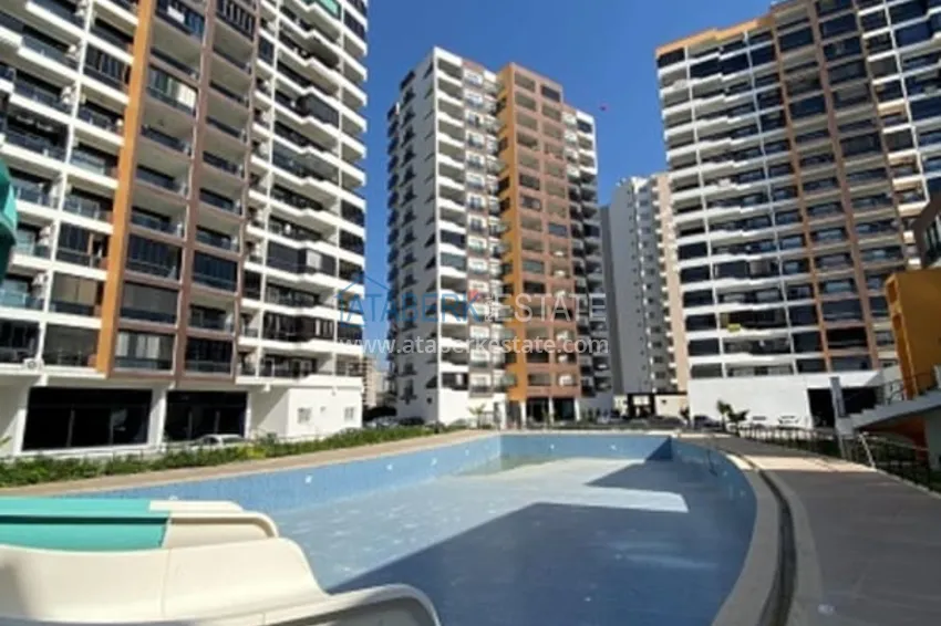 Квартира 2+1 с мебелью в молодом жилом комплексе в районе Арпачбахшиш – Мерсин 1 