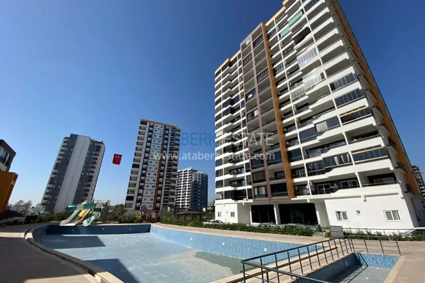 Квартира 2+1 с мебелью в молодом жилом комплексе в районе Арпачбахшиш – Мерсин 2 