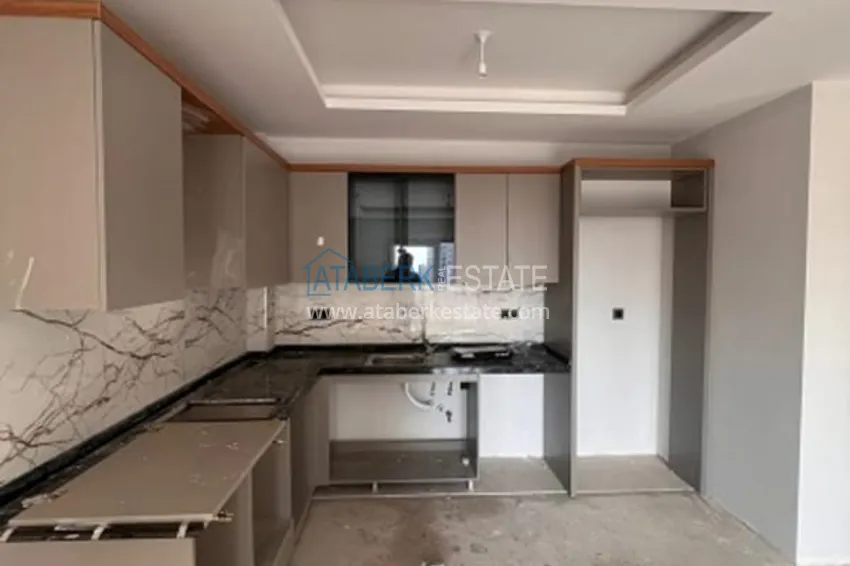 Приобрести Квартира 1+1 на завершающем этапе строительства район Арпачбахшиш – Мерсин 1