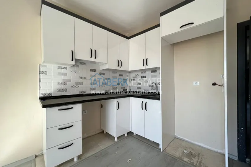 Приобрести Квартира 1+1 с чистовой отделкой в пешей доступности от моря район Арпачбахшиш – Мерсин 2 