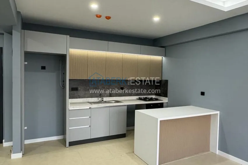 Приобрести Квартира 1+1 в новом жилом комплексе в 300 метрах от моря Арпачбахшиш – Мерсин 2 