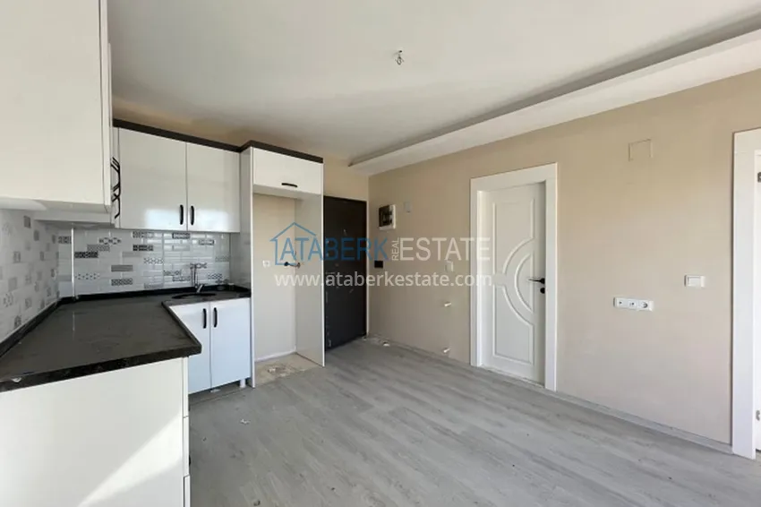 Приобрести Квартира 1+1 с чистовой отделкой в пешей доступности от моря район Арпачбахшиш – Мерсин 1 