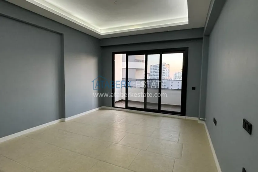 Приобрести Квартира 1+1 в новом жилом комплексе в 300 метрах от моря Арпачбахшиш – Мерсин 1 