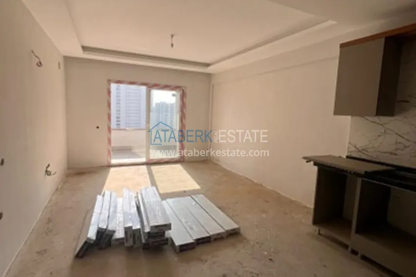 Приобрести Квартира 1+1 на завершающем этапе строительства район Арпачбахшиш – Мерсин 6