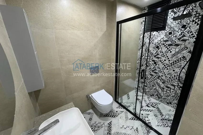 Приобрести Квартира 1+1 в новом жилом комплексе в 300 метрах от моря Арпачбахшиш – Мерсин 5 