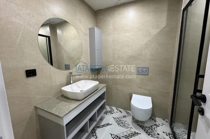 Приобрести Квартира 1+1 в новом жилом комплексе в 300 метрах от моря Арпачбахшиш – Мерсин 6 