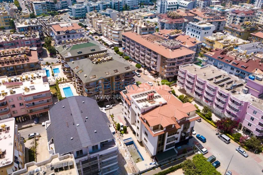 Двухкомнатная квартира с мебелью и застекленным балконом в районе Оба, Алания 2