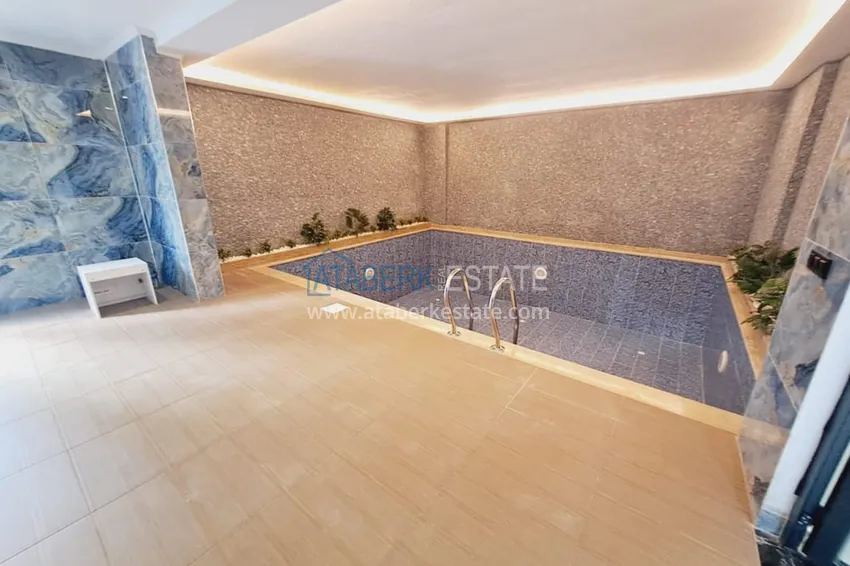 Двухкомнатная квартира с чистовой отделкой в Махмутларе – район субботнего рынка 11 