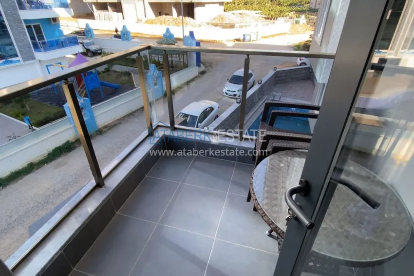 Приобрести Двухкомнатная квартира с мебелью в районе Махмутлар, Алания 11 