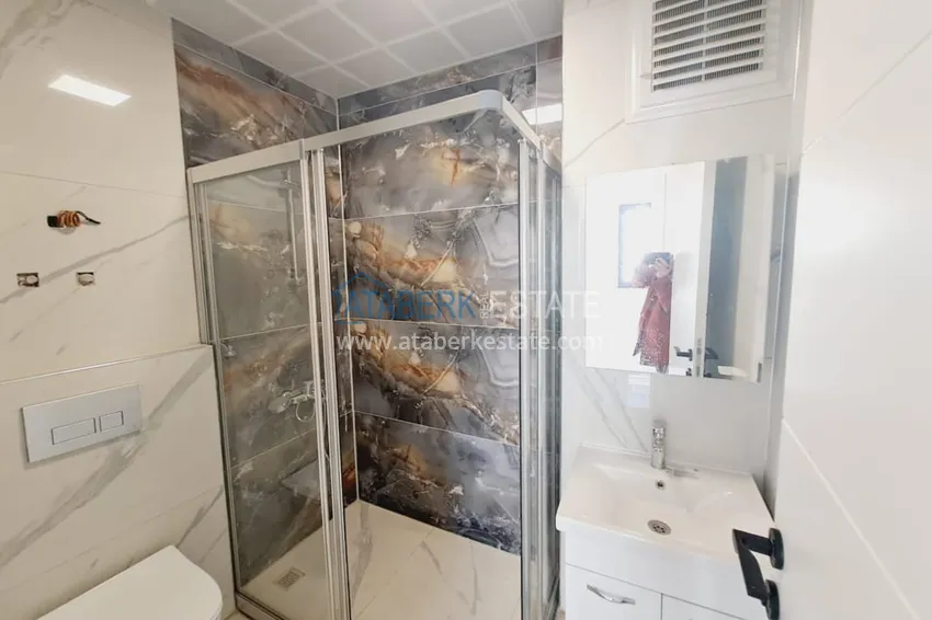 Приобрести Двухкомнатная квартира с чистовой отделкой в Махмутларе – район субботнего рынка 5 